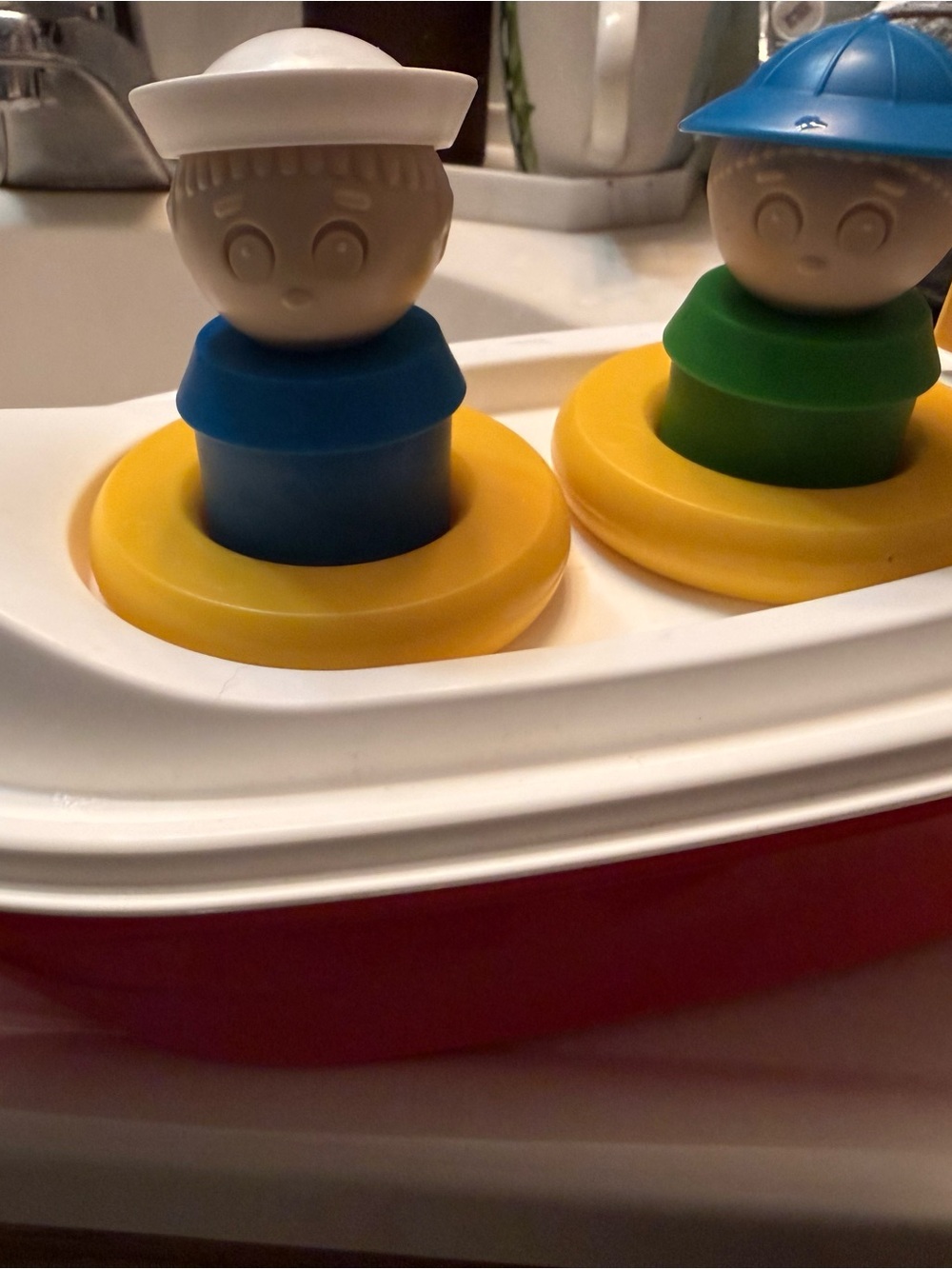 Tupperware Blue and Green Stackable Boat Peg Toy with Yellow Rings